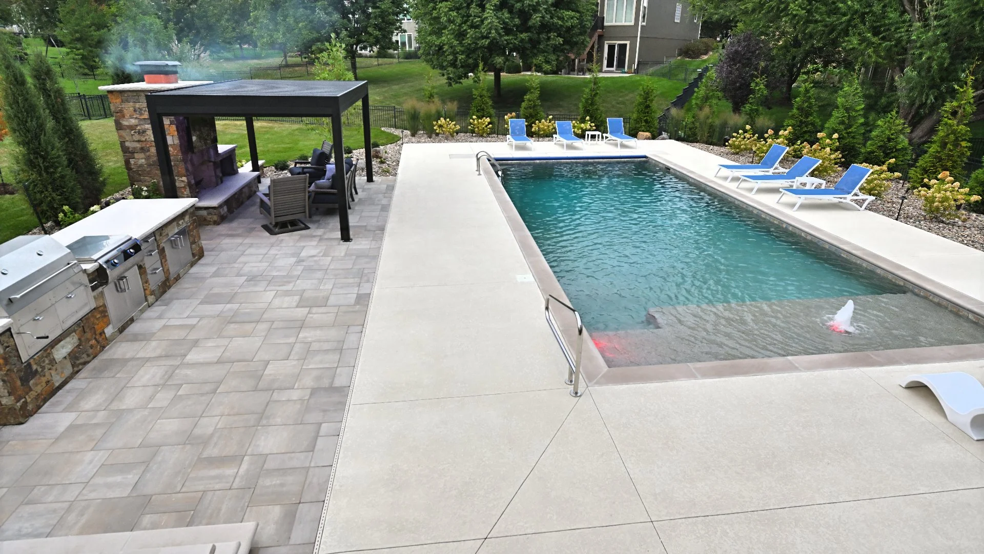 Leawood, KS Outdoor Living Project - Pool, Fireplace, Outdoor Kitchen & More