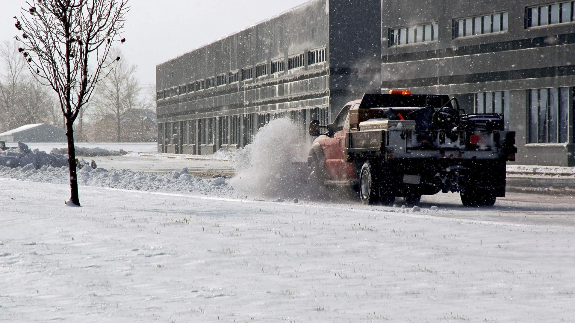 A commercial property being cleared of snow in and around Overland Park, KS.