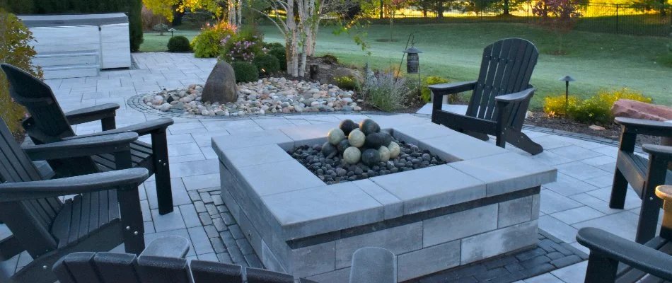 Fire pit with chairs on a patio in Overland Park, KS.