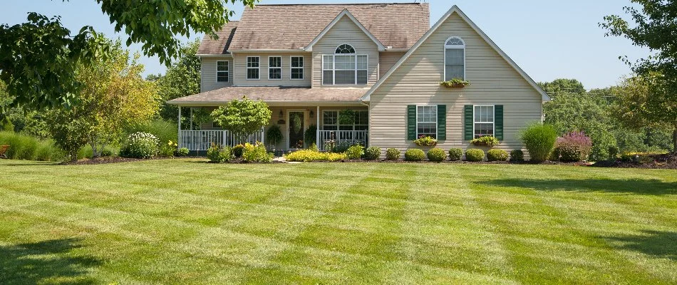House with mowed lawn in Overland Park, KS.