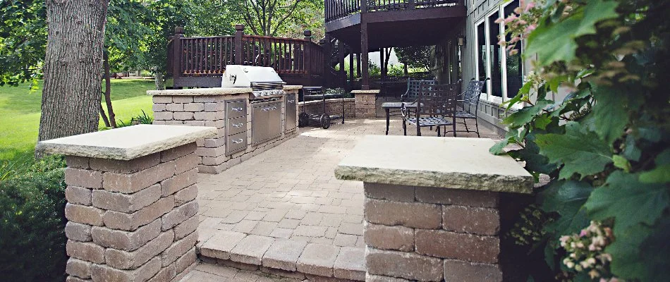 Paver patio with an outdoor kitchen in Overland Park, KS.