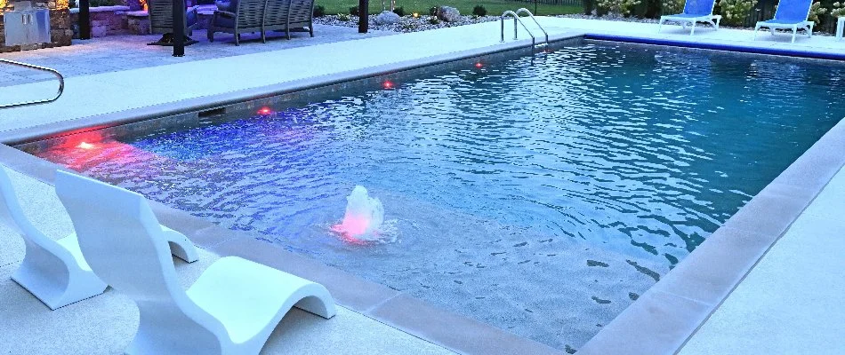 Swimming pool in Overland Park, KS, with bubbler and lighting.