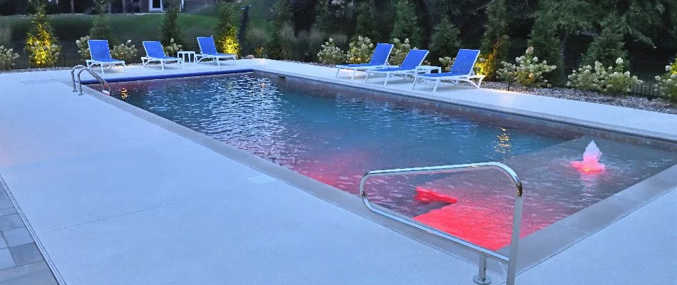 Pool in Overland Park, KS, with integrated lighting.