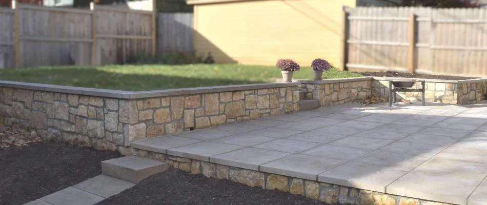 Retaining wall in Overland Park, KS, next to a patio.