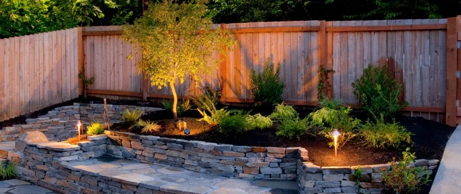 Uplighting plants on a landscape in Overland Park, KS.