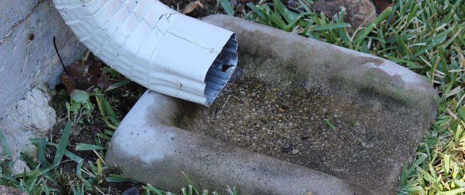White downspout in Overland Park, KS.