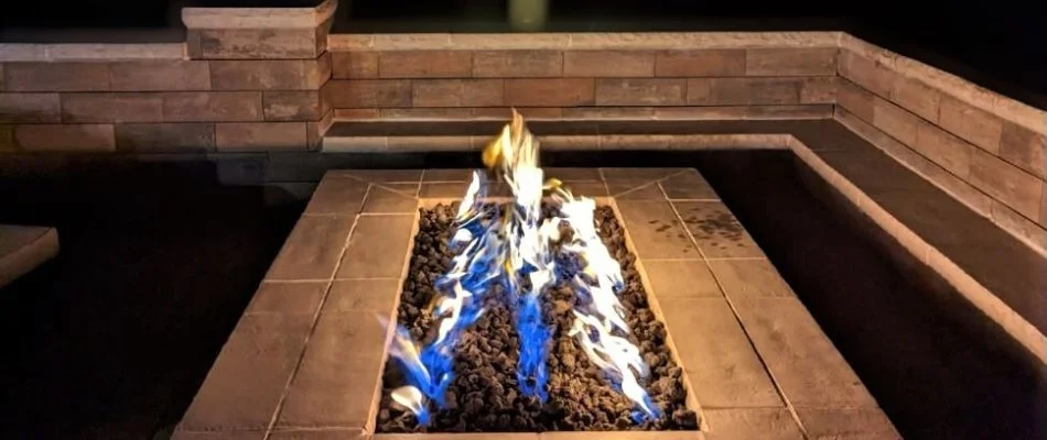 Burning fire pit on a property in Overland Park, KS.