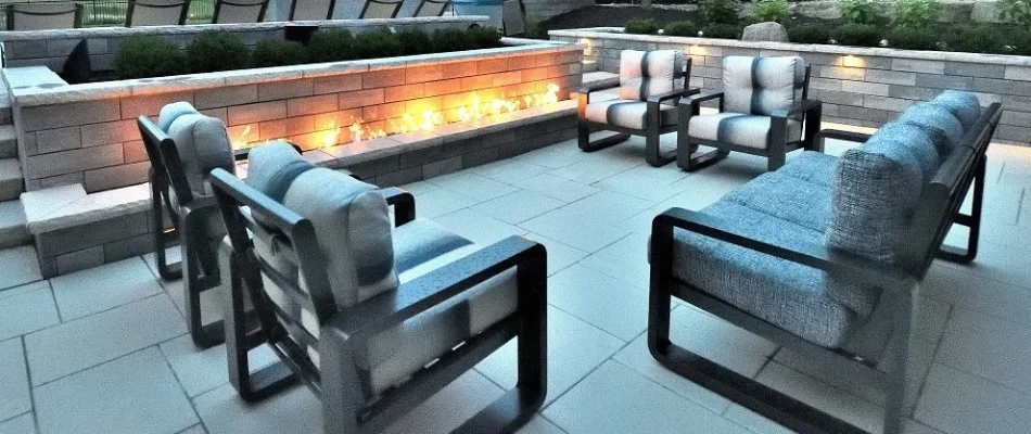 Chairs in front of a fire feature in Louisburg, KS.