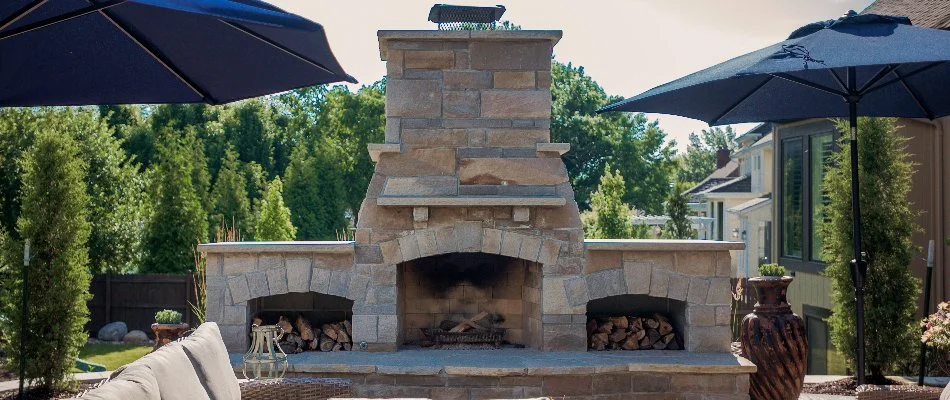 Large outdoor fireplace on a property in Overland Park, KS.