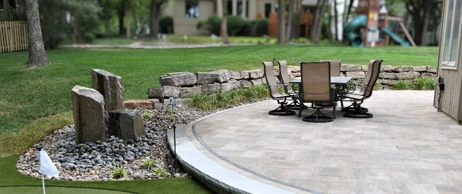 Patio and a retaining wall on a property in Mission, KS.
