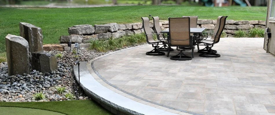 Patio with a retaining wall in Paola, KS.