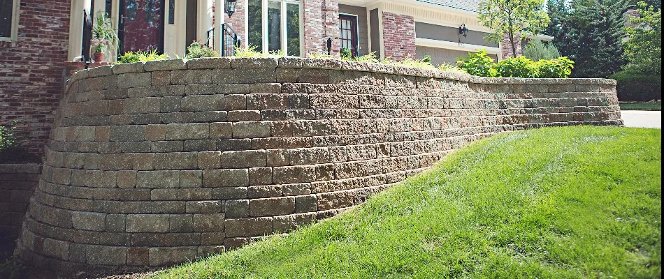 A retaining wall in Overland Park, KS, in front of a house.