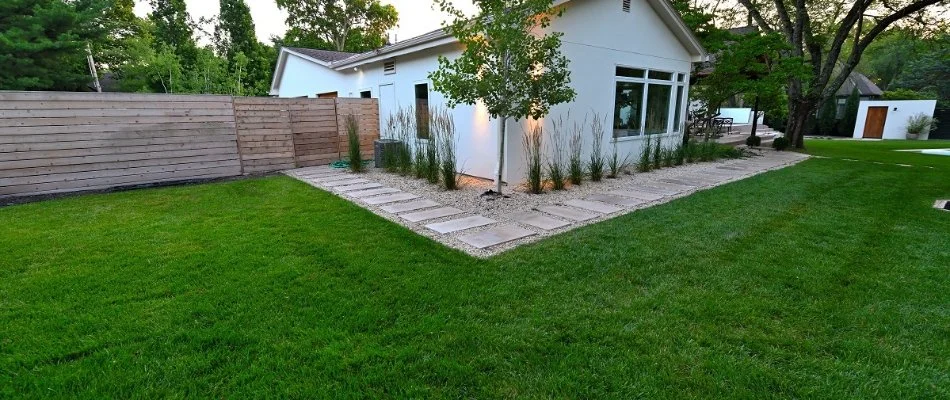 Sod on a property next to a walkway in Leawood, KS.