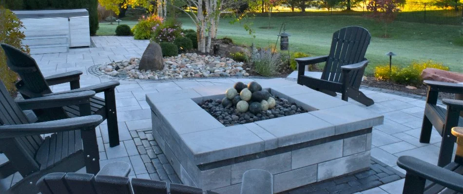 Square fire pit on a property in Overland Park, KS.