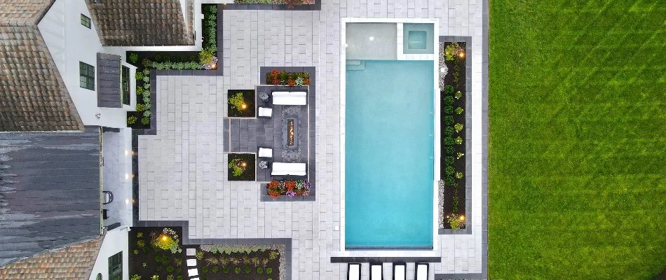Top-down aerial view of a pool and patio area in Fairway, KS.